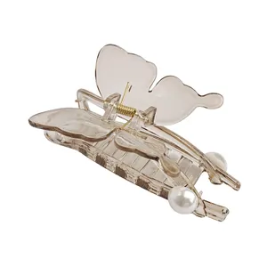 Transparent butterfly hair claw clip with pearl accents and durable gold metal spring
