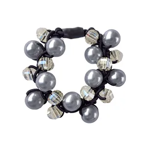 Elastic hair tie with grey metallic pearls and faceted clear glass beads on white base