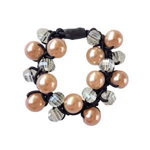 Elastic hair tie featuring champagne pearls and faceted crystal beads for ponytails