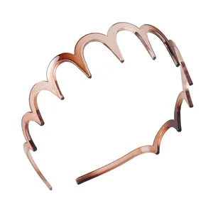 Barnsteenkleurige golfvormige antislip diadeem van hars met schildpadtextuur en breed design