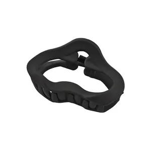 Macro shot of minimalist matte black hair claw clip with wave design and inner grip teeth