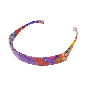 Detailed macro view showing non-slip inner teeth of the colorful floral resin headband