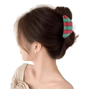 Triangle hair claw clip with red and green plaid pattern for elegant updo styles
