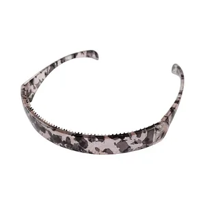 Close-up of leopard pattern folding headband with inner non-slip teeth for secure styling