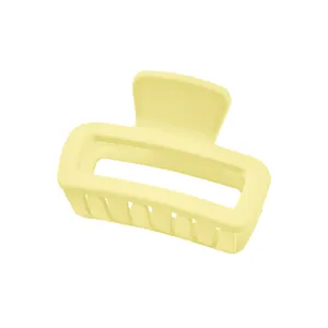 Matte cream yellow rectangular hollow hair claw clip with smooth frosted finish