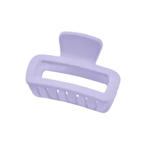 Detailed view of lavender matte hollow hair claw clip with rectangle design and sturdy teeth