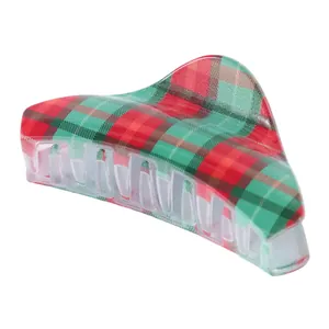 Red and green plaid hair claw clip in triangular design for elegant hairstyling