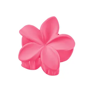 Detailed view of matte rose pink frangipani hair claw clip with durable metal spring