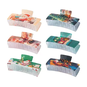 6-pack Christmas print rectangular hair claws with festive motifs on frosted acrylic