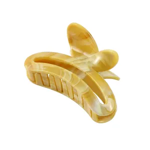 Amber acetate butterfly hair claw clip with marble texture for elegant hairstyles
