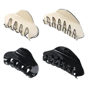 Classic black and cream acetate hair claws set with minimalist glossy finish for women