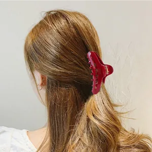 Deep red hollow crescent acetate hair claw clip for elegant bun hairstyles for women