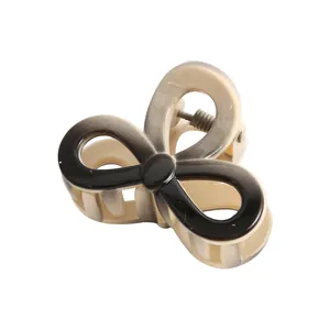 Fashionable 4cm gradient hair claw clip with unique hollow figure-eight design in black and beige