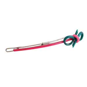 Minimalist pink and green bow hair clip featuring a hollowed acetate fashion design