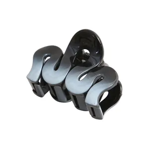Detail of 4cm gradient hair claw clip featuring S-shaped teeth and durable metal spring