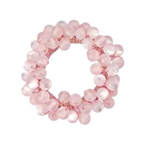 Elegant pink opalescent bead hair tie with elastic band for ponytails and buns