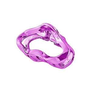 Detail of vibrant purple hollow cloud hair claw clip with mirror finish metallic coating