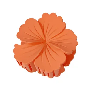 Orange matte finish 8cm frangipani flower hair claw clip for elegant hairstyles