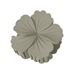 Detail of 8cm gradient plumeria hair claw clip with matte finish and spring mechanism