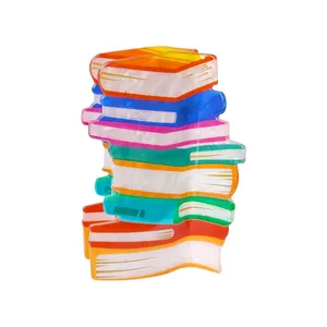 Vue détaillée de la pince à cheveux en acétate au design créatif de livres colorés