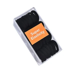 Close-up of 32-piece black high-elasticity hair tie set in a clear storage box