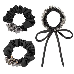 Three-piece black hair accessory set with crystal beads and long ribbon bow tie