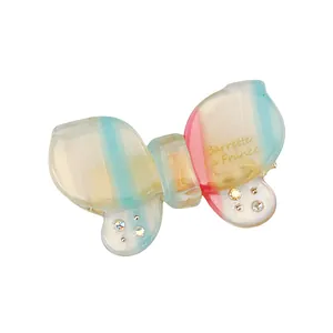 Sparkling gradient butterfly hair clip with rhinestones and Barrette la France script