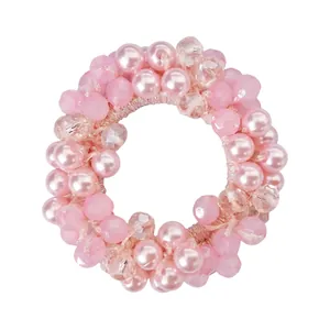 Pink faux pearl and faceted crystal elastic hair tie for elegant ponytail styling