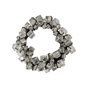 Close-up of elastic hair tie with faceted grey cube beads for sleek ponytail styling