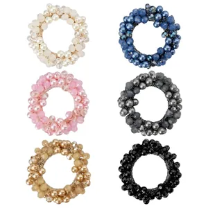 Set of six colorful rhinestone and pearl elastic hair ties for stylish ponytails