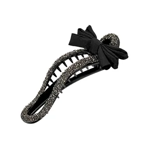 Elegante pinza para el cabello negra con pedrería y lazo de cinta para peinados de mujer