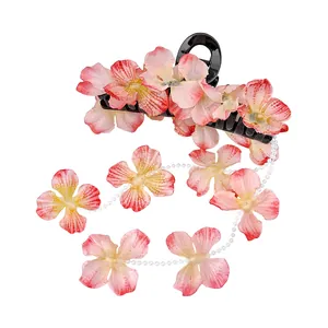 Pince à cheveux fleur avec pétales d'orchidées dégradés et pompon en perles pour femme