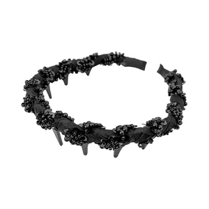 Serre-tête ondulé noir pour femme orné de perles, paillettes et pointes punk