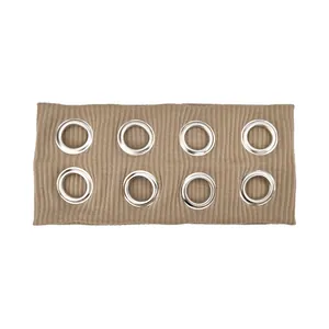 Macro detail of khaki ribbed knit headband featuring a double row of eight silver metal eyelets