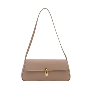 Morandi pink baguette shoulder bag in pebbled leather with a gold U-shaped metal clasp