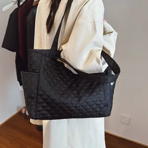 Classic black quilted tote bag for women with large capacity and stylish rhombus stitching