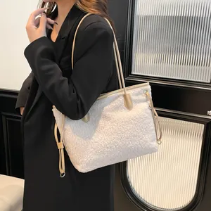 White faux fur tote bag with long shoulder straps and drawstring detail for women