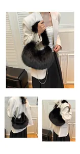Detailed views of a black faux fur dumpling bag with silver chain and bead handle