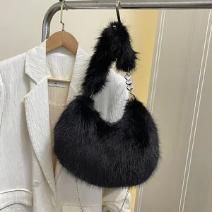 Furry black faux fur hobo bag with silver heart charms and chain strap detail