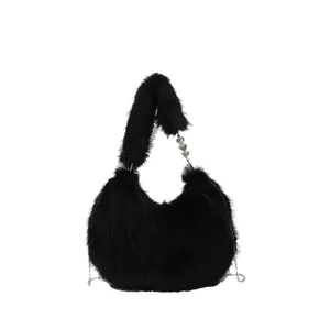 Fuzzy black hobo bag with plush faux fur and a silver heart charm chain strap