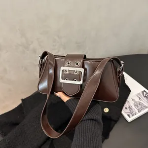 Dark brown patent leather underarm bag with a bold silver square metal buckle