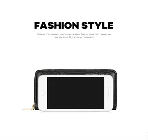 Detail showing high capacity black quilted wallet with zip and smartphone size reference