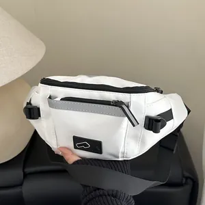White nylon crossbody chest bag with reflective strip and black zipper for men