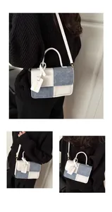 Detail of checkered denim and white leather crossbody bag with top handle and strap