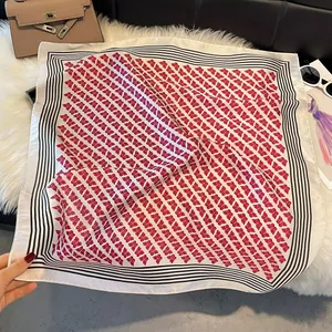 Elegant square scarf with red butterfly patterns and black and white striped border