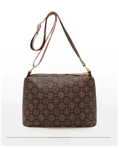 Detailed back view of the brown vintage floral crossbody bag with gold-tone hardware