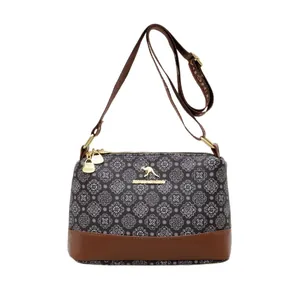 Floral print crossbody bucket bag with brown base and wide adjustable shoulder strap