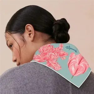Detail of vintage floral silk scarf with pink tulips on a soft light green background