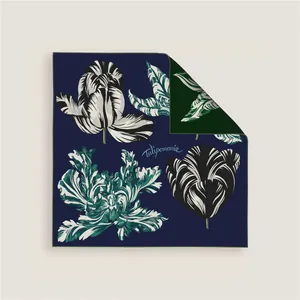 Detailed view of square silk scarf featuring tulip pattern and Tulipomanie script design