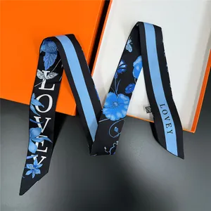 Sciarpa sottile stile francese 120 cm con stampa floreale blu su confezione regalo arancione